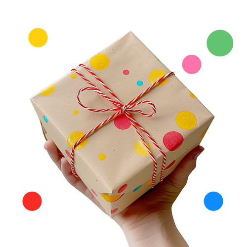 hands holding a gift with colorful dots